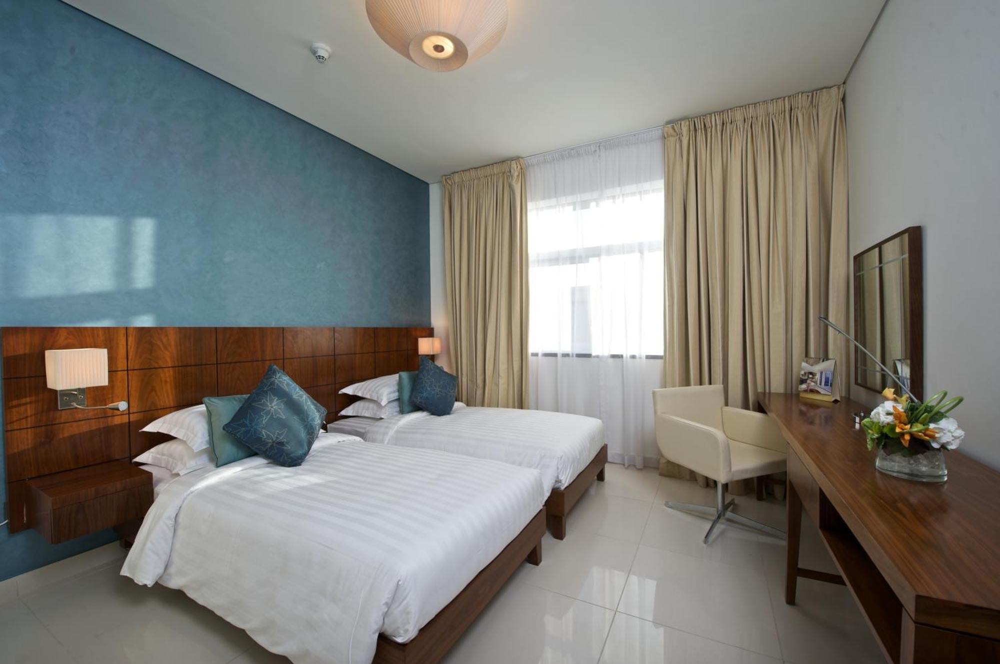 ฟราเซอร์ สวีทส์ โดฮา Aparthotel ภายนอก รูปภาพ A room at the hotel